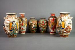 THREE PAIRS OF TWENTIETH CENTURY JAPANESE SATSUMA POTTERY VASES, painted in colours and gilt, one