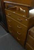 LIGHT OAK G-PLAN CHEST OF FOUR GRADUATED LONG DRAWERS WITH WOODEN LOOP HANDLES