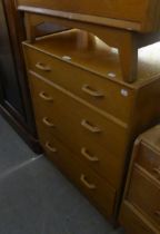 LIGHT OAK G-PLAN CHEST OF FOUR GRADUATED LONG DRAWERS WITH WOODEN LOOP HANDLES