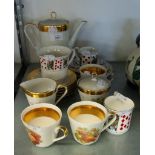 A BAVARIAN CHINA PART COFFEE SET, PRINTED WITH FRUIT AND 'THREE QUEEN'S CHINA 'CUT FOR CARDS'