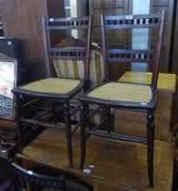 THREE MAHOGANY BEDROOM SINGLE CHAIRS WITH TWO SPINDLE LADDER RAILS TO THE BACK, CANE SEATS (3)