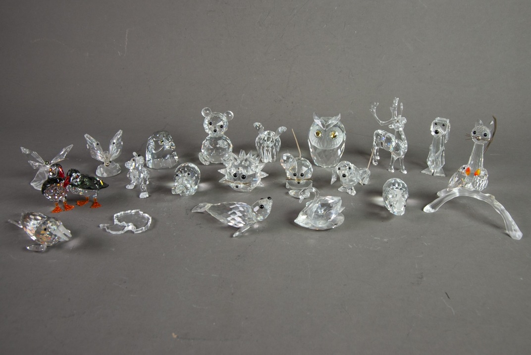 TWENTY SWAROVSKI SMALL GLASS MODELS OF ANIMALS, including: OWL, STAG, PAIR OF PUFFINS, SEALS,