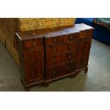 NINETEENTH CENTURY BREAKFRONT HALL CABINET WITH BRUSHING SLIDE AND BRACKET FEET OF SMALL PROPORTIONS