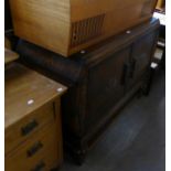 1930’S CARVED OAK SIDEBOARD OF JACOBEAN STYLE, ENCLOSED BY TWO DOORS