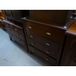 AN OAK DRESSING CHEST OF THREE DRAWERS, WITH TRIPLE MIRROR AND AN OAK BEDSIDE CUPBOARD AND A 1930’