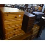A PINE BEDSIDE FOUR DRAWER CHEST A.F.) AND AN OAK THREE DRAWER PEDESTAL AND AN OAK SIDE TABLE  (3)