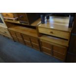 A NATHAN STORAGE CABINET, HAVING TWO CUPBOARD DOORS BELOW AN OPEN SECTION AND A NATHAN TEAK