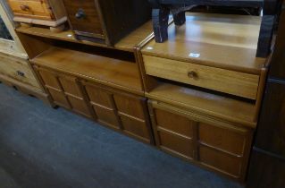 A NATHAN STORAGE CABINET, HAVING TWO CUPBOARD DOORS BELOW AN OPEN SECTION AND A NATHAN TEAK