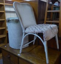 A LLOYD LOOM GOLD COLOURED BEDROOM CHAIR AND MATCHING LINEN RECEIVER, ANOTHER LLOYD LOOM RECEIVER