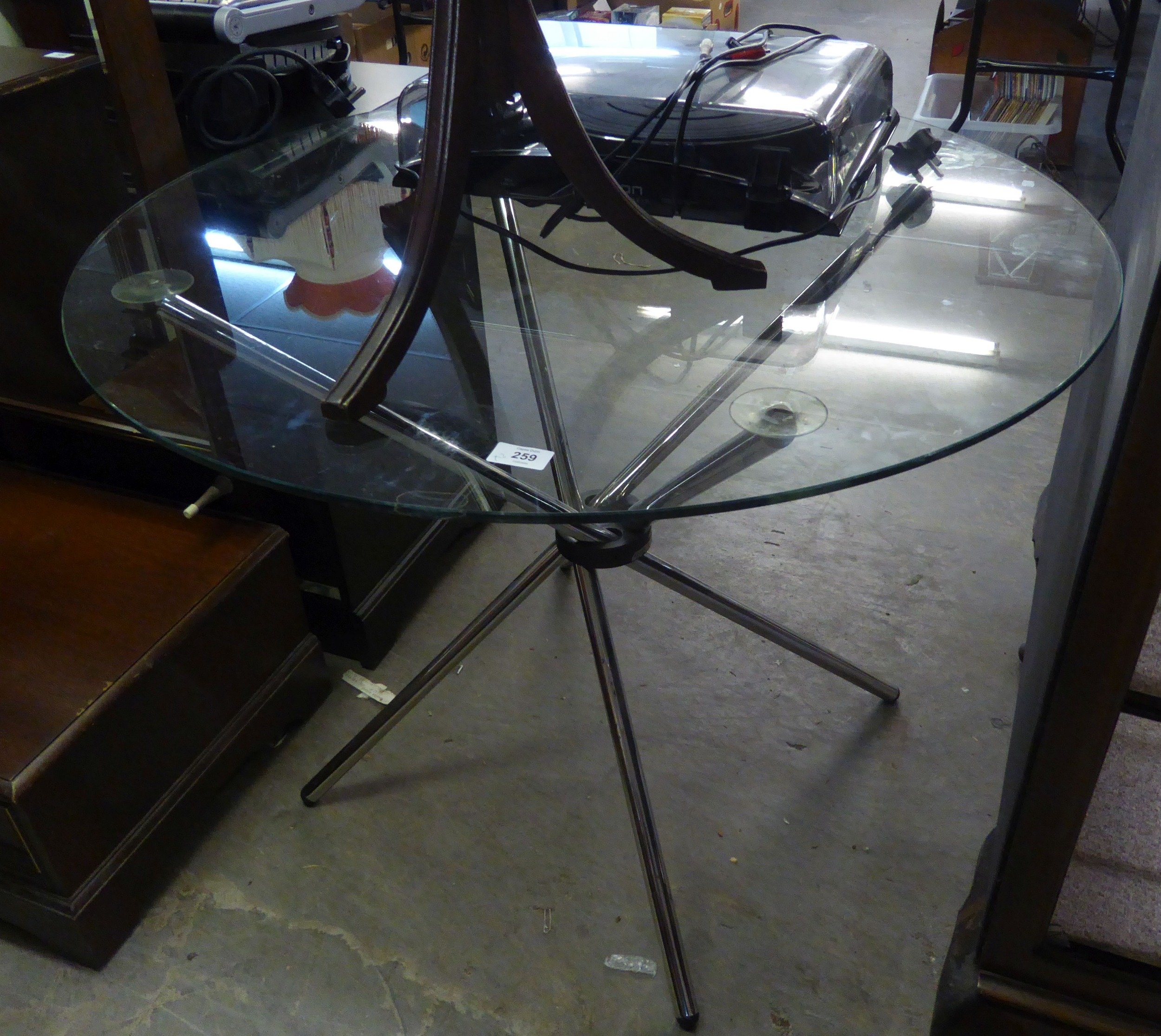 TWO STYLISH RETRO GLASS TOPPED COFFEE/OCCASIONAL TABLES, HAVING CHROME BASES, ONE SQUARE TOP AND