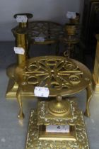 PAIR OF LATE NINETEENTH CENTURY BRASS CANDLESTICKS, WITH CLASSICAL DOLPHIN COLUMNS, PIERCED DRIP