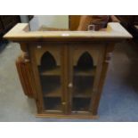 A SMALL PINE TABLE TOP DISPLAY CABINET