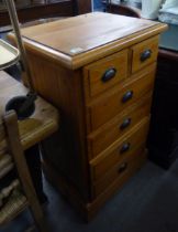 A PINE NARROW CHEST OF TWO SHORT OVER FOUR LONG DRAWERS