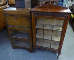 A SMALL GLAZED OAK SINGLE DOOR BOOKCASE, AND AN OAK THREE TIER MINTY STYLE BOOKCASE, AND A TWO