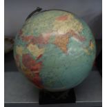 A TERRESTRIAL GLOBE ON STAND