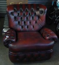 THOMAS LLOYD OBLONG LOUNGE CHAIR BUTTON UPHOLSTERED IN DARK CRIMSON HIDE WITH RECLINING ACTION AND