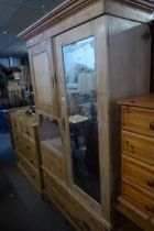 A VICTORIAN PINE DOUBLE WARDROBE, WITH SINGLE MIRROR DOOR (MIRROR A.F.) AND A SINGLE PANEL DOOR WITH