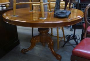 A CIRCULAR MAHOGANY BREAKFAST TABLE WITH TILT-TOP ON TRIPOD BASE