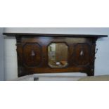 JACOBEAN STYLE OAK MURAL COAT RACK WITH CENTRE OCTAGONAL BEVELLED EDGE MIRROR, WITH SHELF ABOVE, 3’