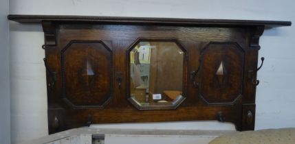 JACOBEAN STYLE OAK MURAL COAT RACK WITH CENTRE OCTAGONAL BEVELLED EDGE MIRROR, WITH SHELF ABOVE, 3’