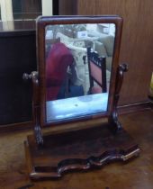 VICTORIAN MAHOGANY SWING TOILET MIRROR, WITH SCROLL SIDE SUPPORTS ON PLATFORM BASE WITH SERPENTINE