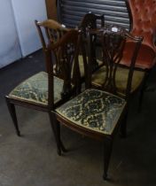 SET OF EDWARDIAN DARK MAHOGANY DRAWING ROOM CHAIRS WITH PIERCED SPLAT BACKS AND PAD SEATS, VIZ, FOUR