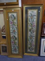 A PAIR OF NEEDLEWORK TAPESTRIES, LONG AND NARROW, DEPICTING FLORAL AND FOLIATE SCROLLS GILT FRAMED