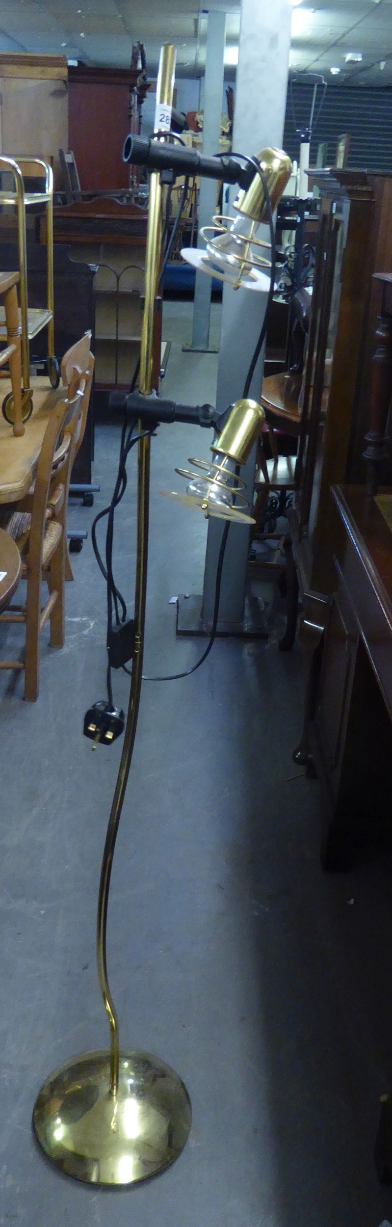 A BRASS EFFECT TWO LIGHT FLOOR STANDING STANDARD LAMP