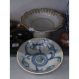 SCOTTISH BLUE AND WHITE POTTERY CIRCULAR BOWL, PAINTED WITH FISH, 9" DIAMETER AND A PEDESTAL BOWL (