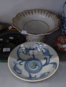 SCOTTISH BLUE AND WHITE POTTERY CIRCULAR BOWL, PAINTED WITH FISH, 9" DIAMETER AND A PEDESTAL BOWL (