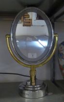 REVLON ELECTRICALLY ILLUMINATED CIRCULAR MAKE-UP MIRROR ON METAL PILLAR AND CIRCULAR BASE