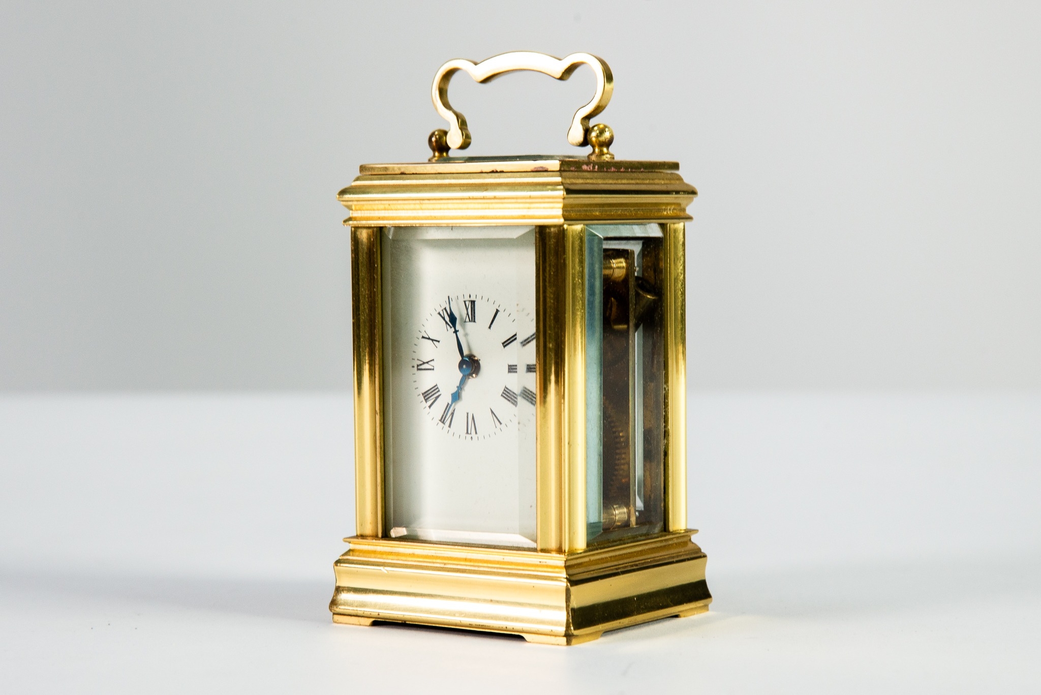 TWENTIETH CENTURY BRASS CASED SMALL CARRIAGE CLOCK, of typical form ...