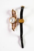 LADY'S THOMAS RUSSELL 9ct GOLD WRISTWATCH with jewelled movement, white roman dial with subsidiary