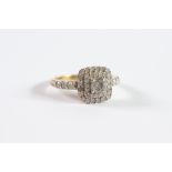 9ct GOLD AND DIAMOND SQUARE CLUSTER RING, one of the tiers with raised centre diamond, approximately