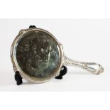 EDWARD VII EMBOSSED SILVER BACKED DRESSING TABLE HAND MIRROR BY W J MYATT & Co, with circular, bevel