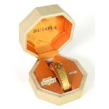 BULOVA GOLD PLATED LADY'S WRIST WATCH with integral BARK TEXTURED BRACELET, in box as supplied