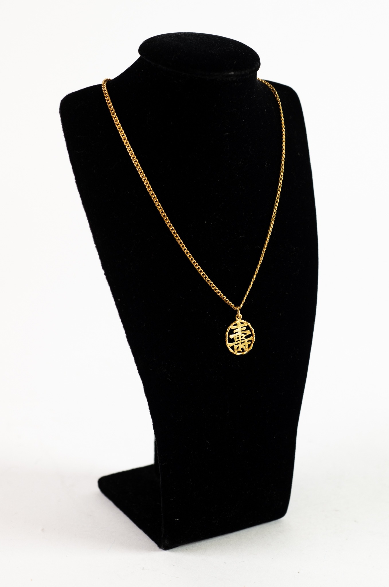 CHINESE FINE CHAIN NECKLACE with curb links with small pierced circular Chinese character PENDANT,