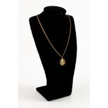 CHINESE FINE CHAIN NECKLACE with curb links with small pierced circular Chinese character PENDANT,