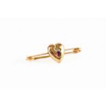 9ct GOLD SAFETY-PIN BROOCH, the centre overlaid with a heart shaped, gypsy set with two tiny
