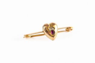 9ct GOLD SAFETY-PIN BROOCH, the centre overlaid with a heart shaped, gypsy set with two tiny