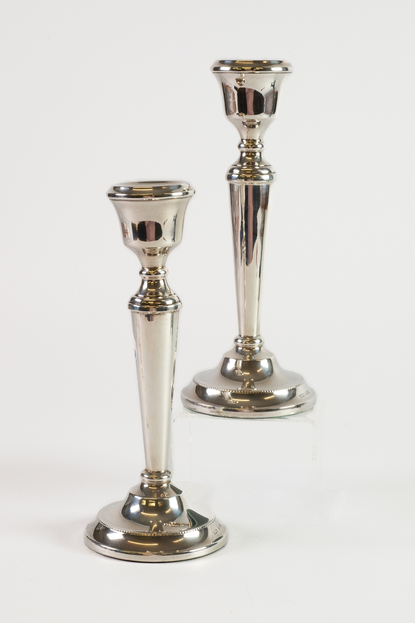 PAIR OF STERLING SILVER DRESSING TABLE CANDLESTICKS, each of baluster form with circular base, 4” (