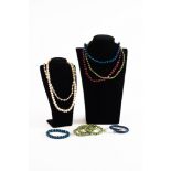 SILVER AND PEACOCK BLUE CULTURED PEARL NECKLACE and BRACELET set; similar green oval cultured