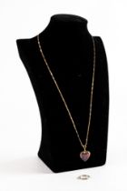 CHINESE SILVER EMBOSSED BAND RING and a gold plated CHAIN NECKLACE, 24in (61cm) long, with gold