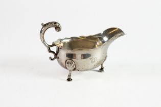 EDWARD VII PLAIN SILVER SAUCE BOAT BY DANIEL & JOHN WELBY, with leaf capped flying scroll handle,