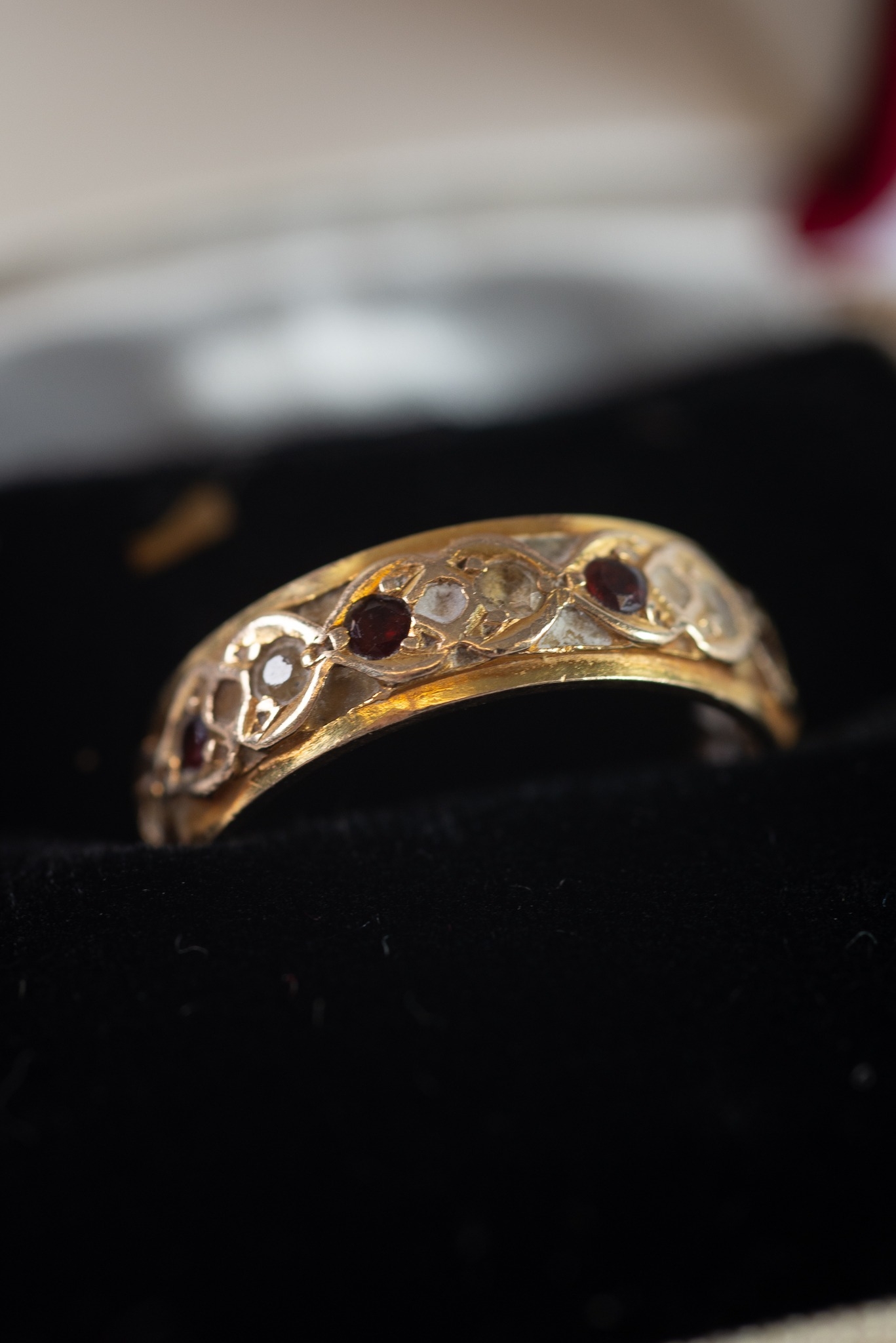 9ct GOLD TINY GARNET AND WHITE STONE SET ETERNITY RING, together with an unmarked YELLOW and WHITE - Image 3 of 4