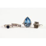 SILVER RING set with large pear-shaped blue stone with surround of white stones; SILVER RING,