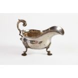 LATE VICTORIAN SILVER SAUCE BOAT OF HEAVY GAUGE BY WAKELY & WHEELER, with leaf capped flying