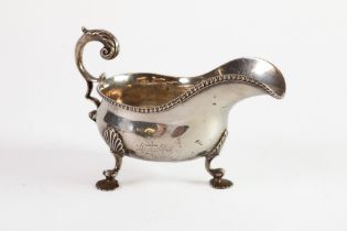 LATE VICTORIAN SILVER SAUCE BOAT OF HEAVY GAUGE BY WAKELY & WHEELER, with leaf capped flying