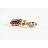 9ct GOLD CROSSOVER RING with 2 oval aquamarines with tiny diamonds to the shoulders; 9ct GOLD TRIPLE