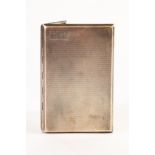 ART DECO PERIOD SILVER POCKET CIGARETTE CASE oblong, with engine turned decoration, initials FW in